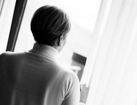 Holding it all Together Contemplative woman gazing out of the window